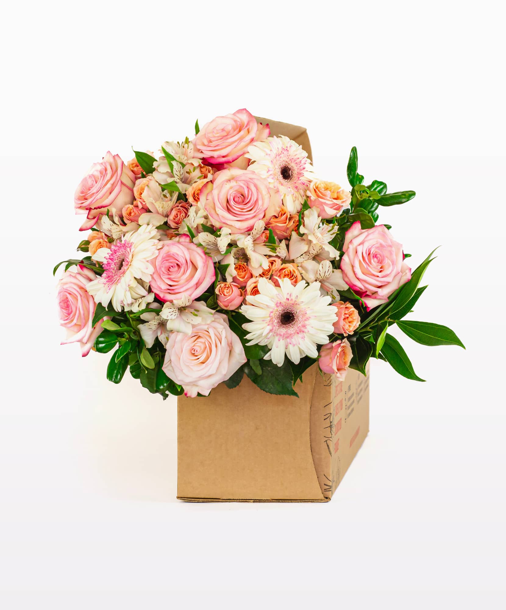 Charming pink rose and daisy bouquet beautifully arranged in a gift box.
